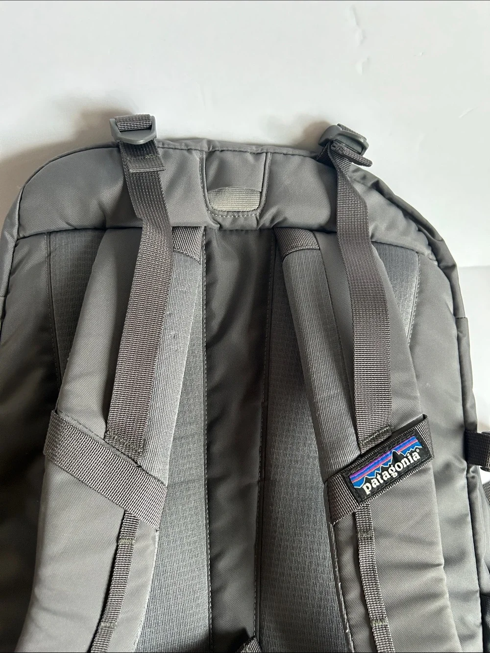 Patagonia Gray Backpack with Yellow Bungee Accents